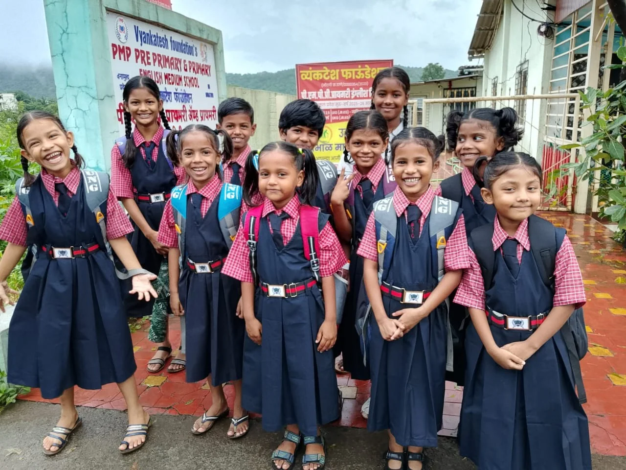Smiling schoolchildren ready for class