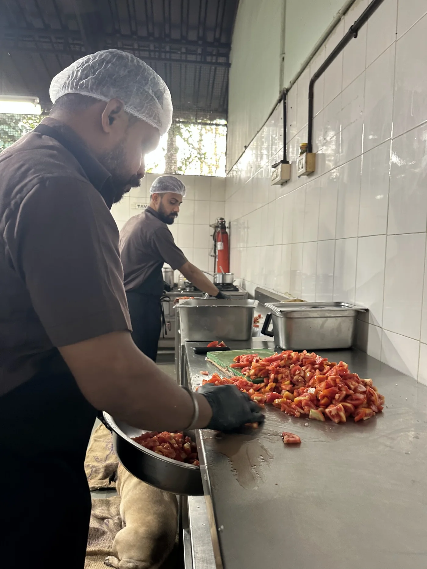 El Shaddai kitchen staff preparing fresh meals