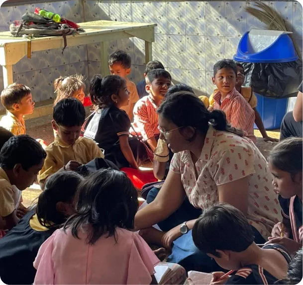 A volunteer helping children in the community