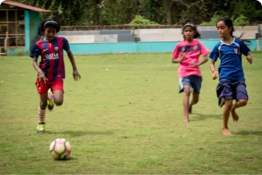 Girls playing football