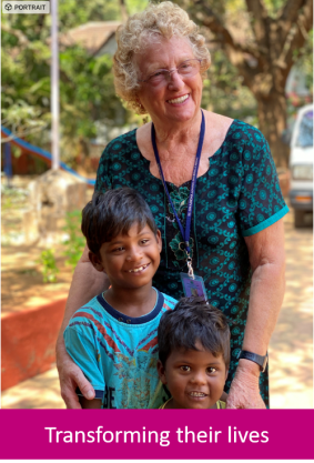 El Shaddai volunteer with children