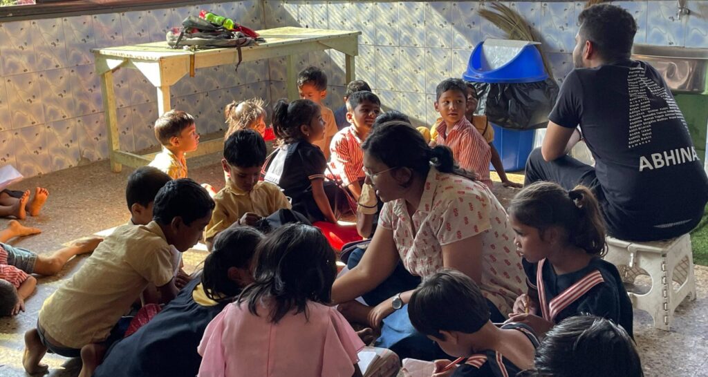 Maria Saju, our dedicated intern, actively engaging with children in our daycare shelter, assisting them with enriching activities. Her compassionate presence fosters a nurturing environment where every child thrives.
